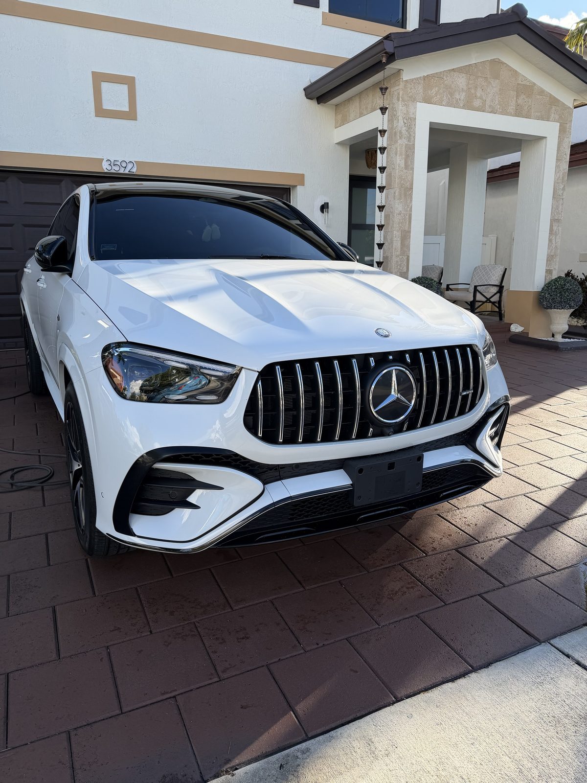 White Mercedes-AMG GLE coupe with a deep gloss finish