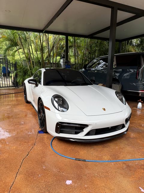 White Porsche 911 GTS after an exterior detail