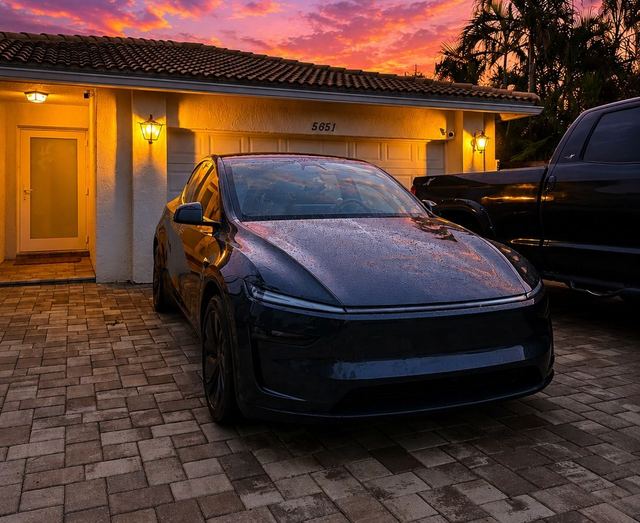 Freshly detailed car at sunset in a Broward driveway