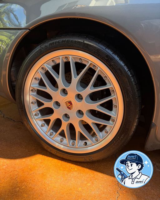Porsche wheel cleaned and dressed after an exterior detail